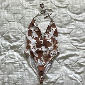 NWOT COW PATTERN ONSIE